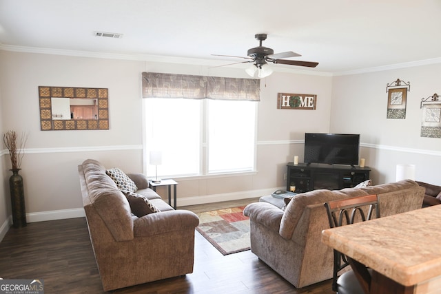 living room with visible vents, ceiling fan, dark wood-style flooring, and crown molding