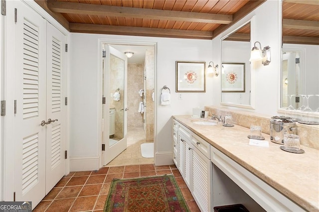 bathroom with beamed ceiling, vanity, wooden ceiling, and a shower stall