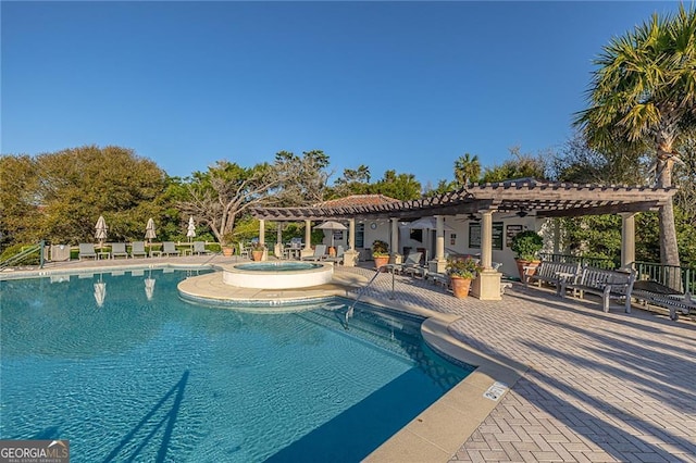 community pool featuring a patio area, a community hot tub, a ceiling fan, and a pergola