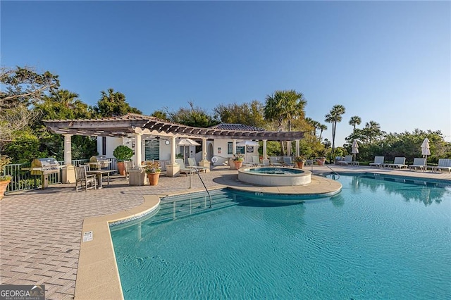 pool with a patio, a community hot tub, and a pergola