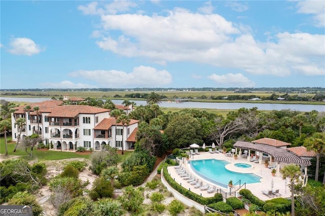 drone / aerial view with a water view