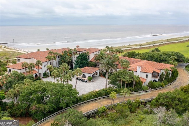 bird's eye view featuring a view of the beach and a water view