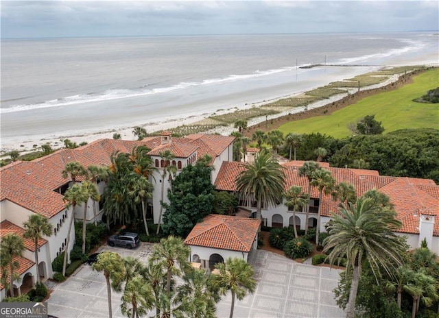 aerial view with a view of the beach and a water view