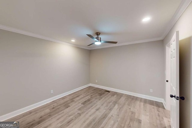 spare room with light wood finished floors, crown molding, baseboards, ceiling fan, and recessed lighting