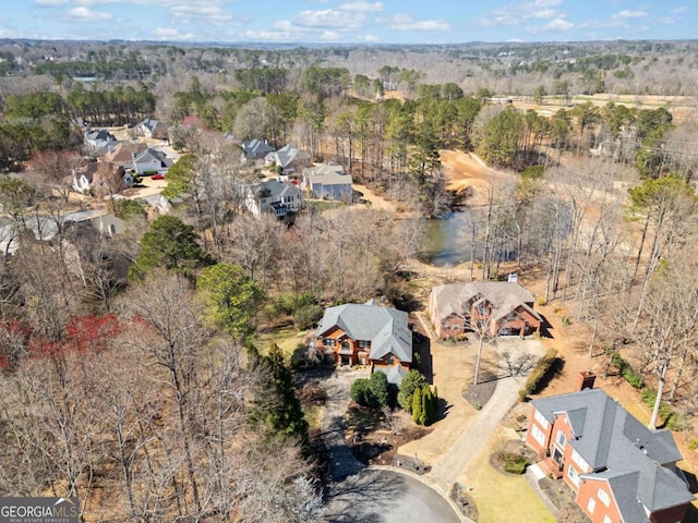 bird's eye view featuring a view of trees