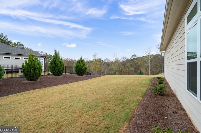 view of yard featuring fence