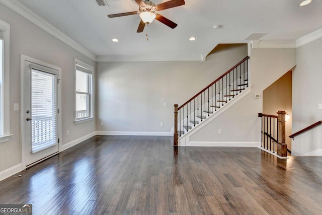 unfurnished living room with stairs, crown molding, ceiling fan, and wood finished floors