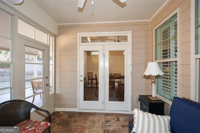 interior space featuring a ceiling fan