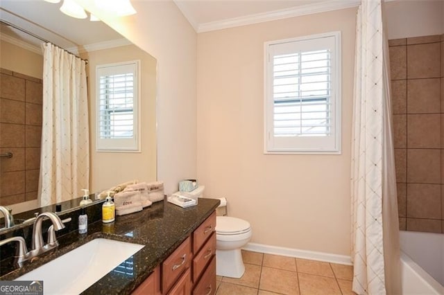 full bath with tile patterned floors, toilet, crown molding, and baseboards