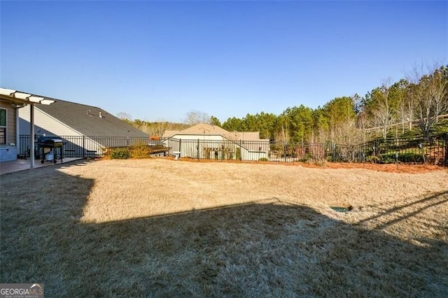 view of yard with fence