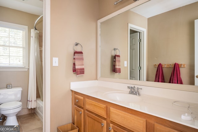 bathroom featuring shower / bathtub combination with curtain, toilet, vanity, and tile patterned flooring