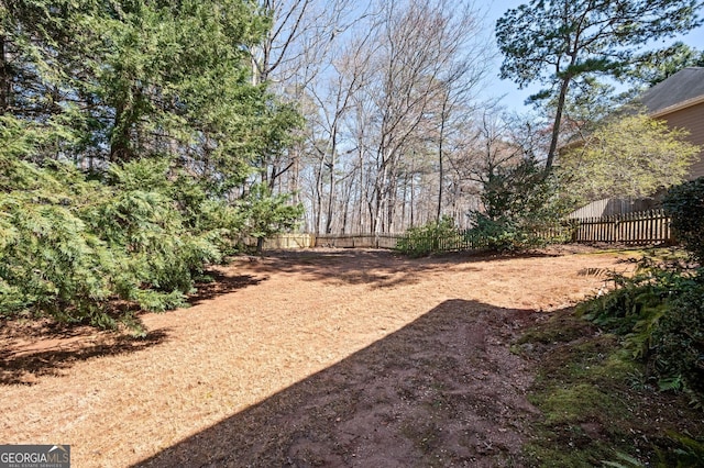 view of yard featuring fence