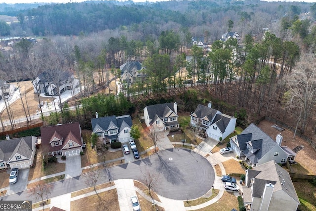 bird's eye view with a residential view and a view of trees