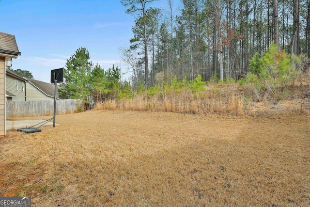 view of yard with fence