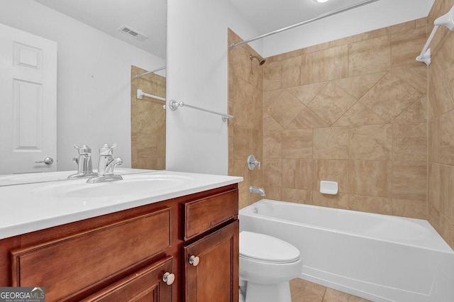 bathroom featuring vanity, visible vents,  shower combination, tile patterned floors, and toilet