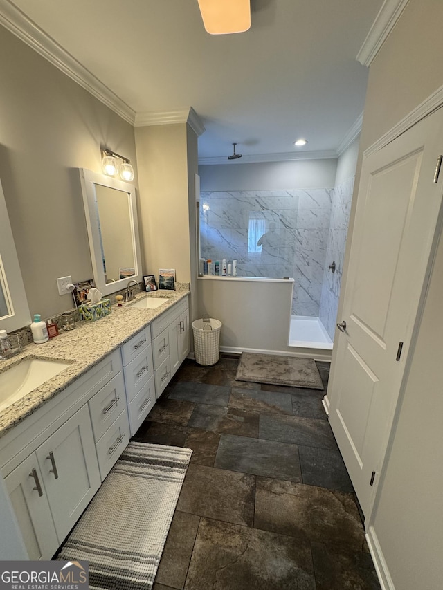 bathroom with a sink, a walk in shower, crown molding, and double vanity