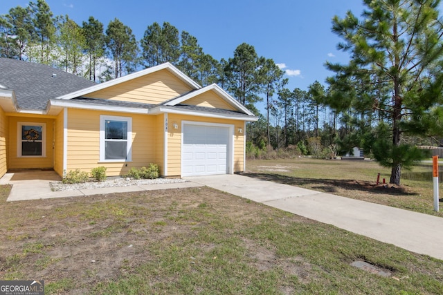 single story home with a front yard, a garage, driveway, and roof with shingles