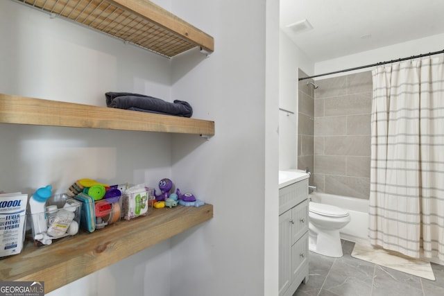 full bathroom with visible vents, vanity, toilet, and shower / tub combo