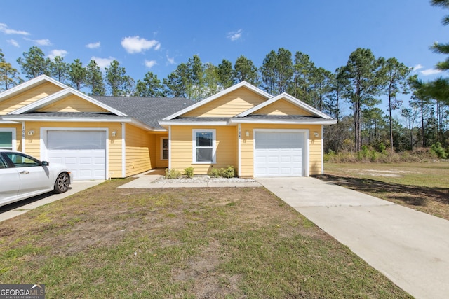 ranch-style house with a garage, concrete driveway, a front lawn, and a shingled roof