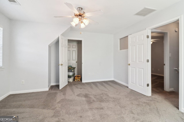 unfurnished bedroom with visible vents, baseboards, and carpet floors