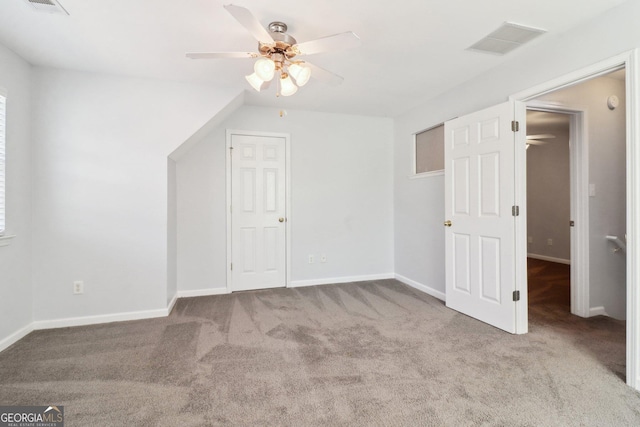 additional living space with visible vents, baseboards, carpet, and a ceiling fan