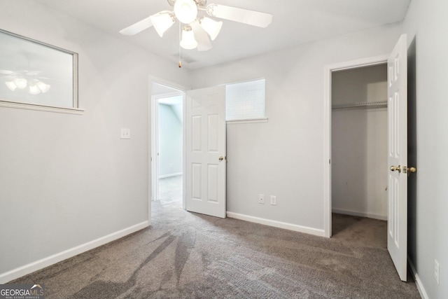 unfurnished bedroom featuring a closet, baseboards, and carpet