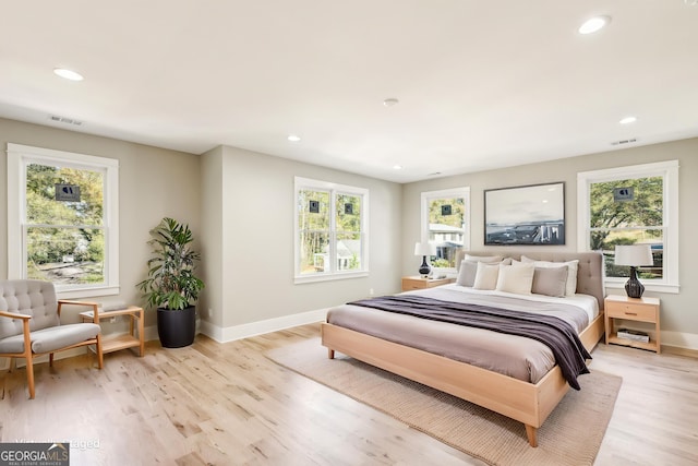 2611 Charlesgate Ave, Decatur, GA 30030 - bedroom with multiple windows, recessed lighting, light wood finished floors, and baseboards