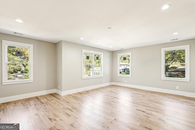 2611 Charlesgate Ave, Decatur, GA 30030 - unfurnished room with healthy amount of natural light, light wood-style flooring, recessed lighting, and baseboards
