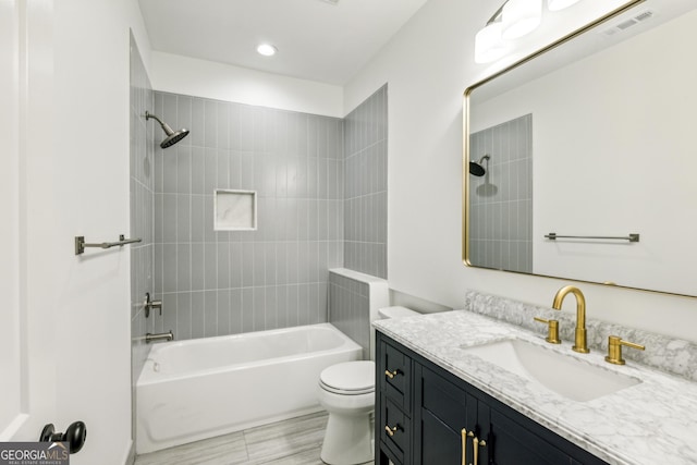 2611 Charlesgate Ave, Decatur, GA 30030 - bathroom featuring vanity, toilet, and bathing tub / shower combination