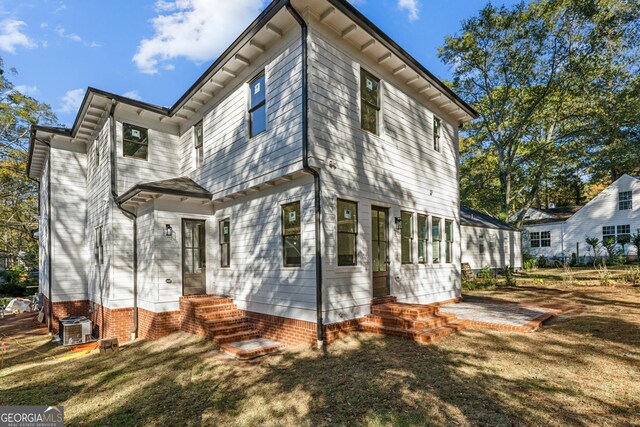 2611 Charlesgate Ave, Decatur, GA 30030 - rear view of property with central air condition unit and entry steps