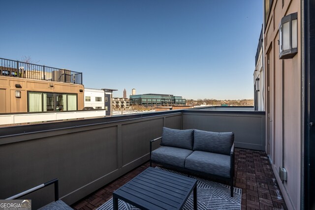balcony with outdoor lounge area
