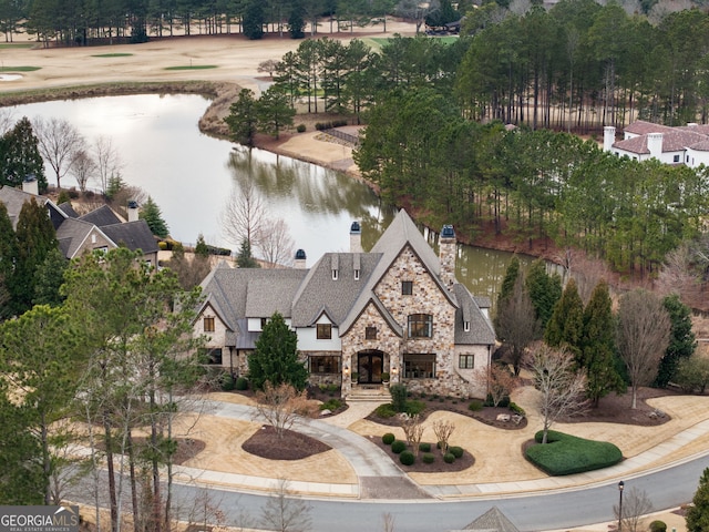 birds eye view of property featuring a water view