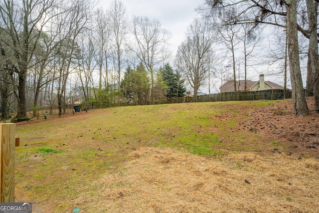 view of yard featuring fence