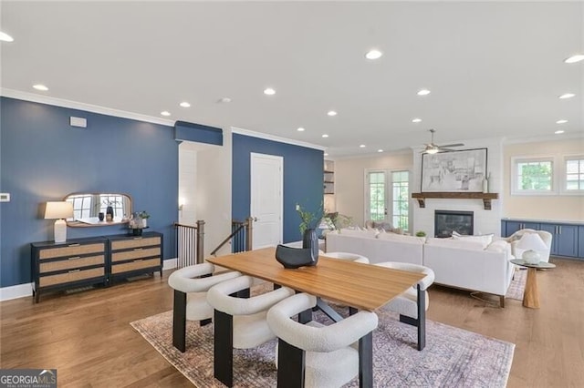 385 Rowes Cir, Alpharetta, GA 30009 - dining space featuring ornamental molding, a ceiling fan, healthy amount of natural light, recessed lighting, and wood finished floors