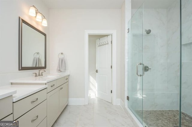 385 Rowes Cir, Alpharetta, GA 30009 - bathroom featuring marble finish flooring, a stall shower, vanity, and baseboards