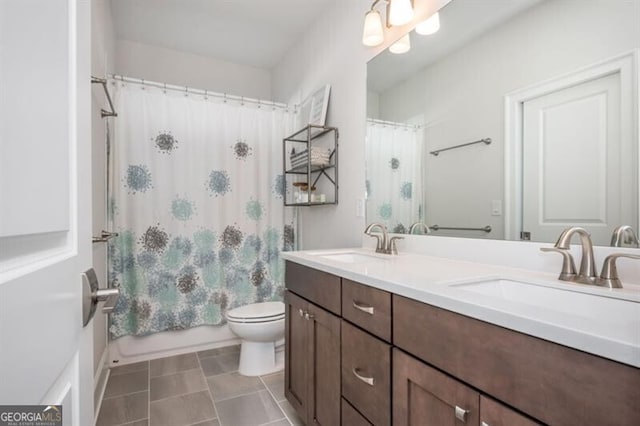 385 Rowes Cir, Alpharetta, GA 30009 - bathroom with toilet, double vanity, and shower / bath combo with shower curtain