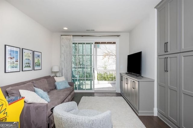 385 Rowes Cir, Alpharetta, GA 30009 - living area featuring dark wood-type flooring and recessed lighting