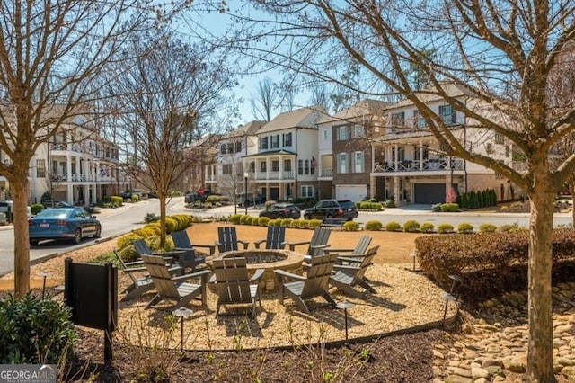 385 Rowes Cir, Alpharetta, GA 30009 - view of community with a residential view and an outdoor fire pit