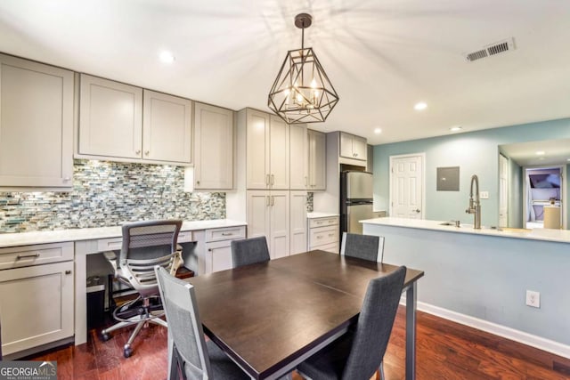 dining area featuring dark wood-style floors, visible vents, baseboards, and recessed lighting