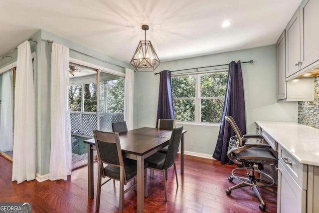 dining area with dark wood finished floors, recessed lighting, and baseboards