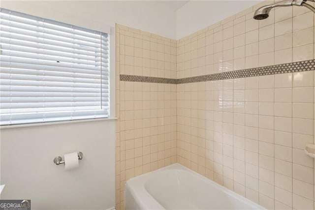 bathroom featuring shower / tub combination