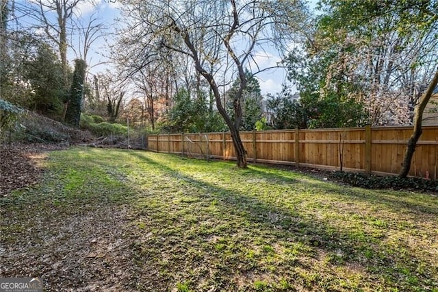 view of yard featuring fence