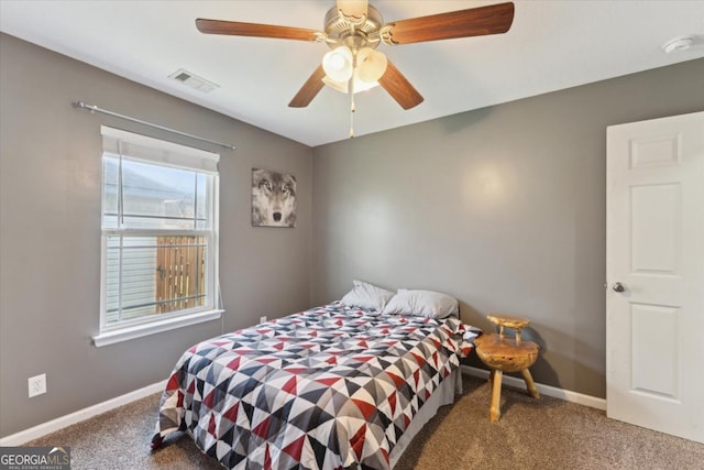 bedroom with a ceiling fan, carpet flooring, baseboards, and visible vents