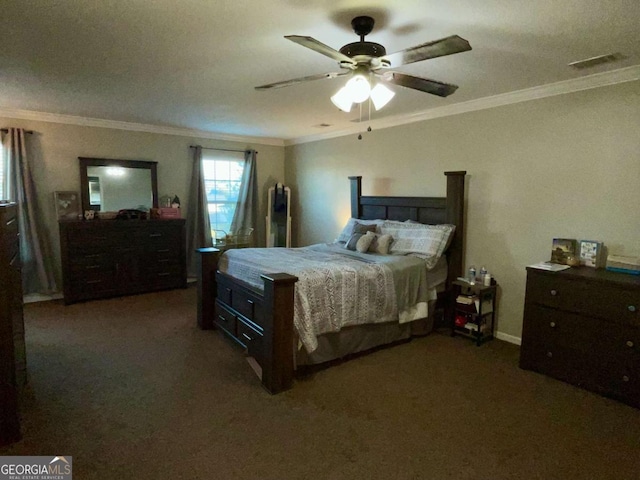 bedroom featuring visible vents, ornamental molding, and carpet floors