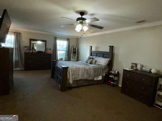 bedroom featuring multiple windows, crown molding, and carpet