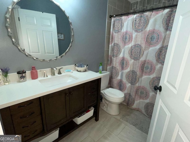 full bath with tile patterned flooring, toilet, vanity, and a shower with curtain