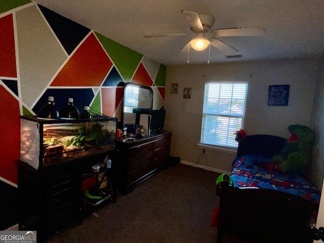 carpeted bedroom featuring visible vents and baseboards