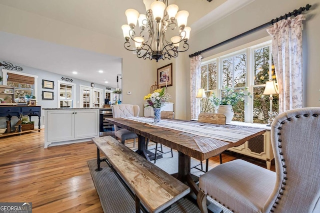 4770 Hilltop Dr NW, Acworth, GA 30101 - dining area with a chandelier, light wood-type flooring, wine cooler, and recessed lighting