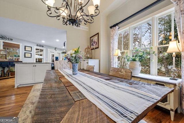 4770 Hilltop Dr NW, Acworth, GA 30101 - dining space featuring light wood-type flooring, a chandelier, and recessed lighting