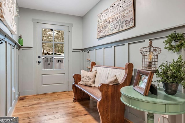 4770 Hilltop Dr NW, Acworth, GA 30101 - sitting room featuring a decorative wall and light wood finished floors